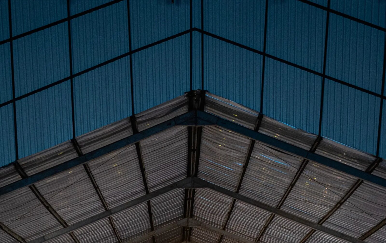 The high, fully covered steel roof of the Block42 warehouse at Nuanu Creative City